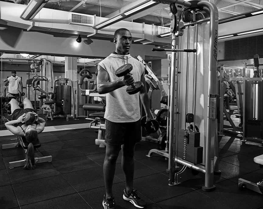 man working out in fitness center