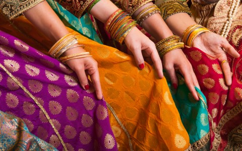 detail of colorful dresses with patterns