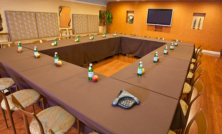 meetings and events space with a square shaped table`
