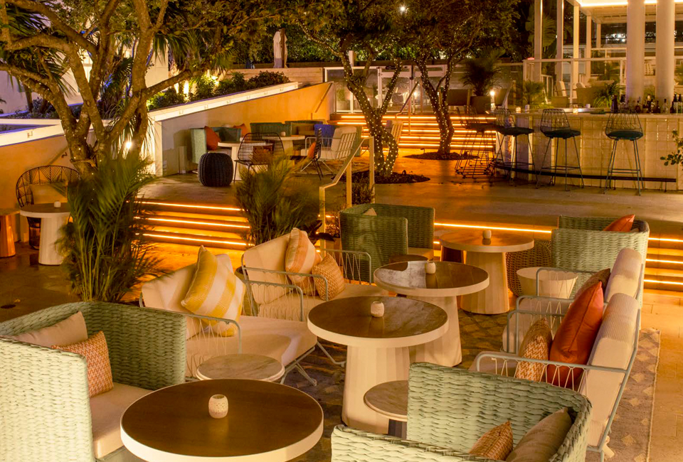 outdoor patio and soft seating area at night