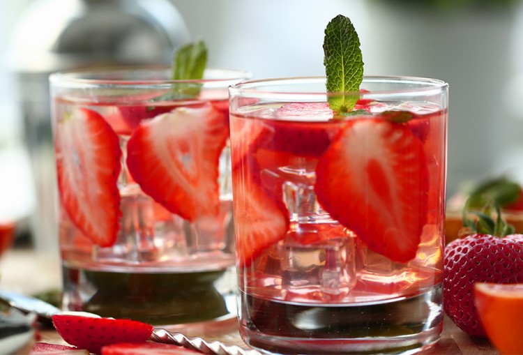 close up of strawberry and mint cocktail