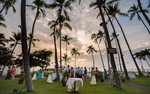 Wedding arrangement at sunset with palm trees