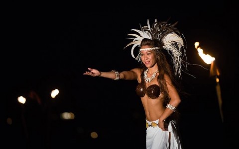 performer with a traditional headpiece