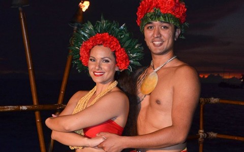 couple with red and green headpieces
