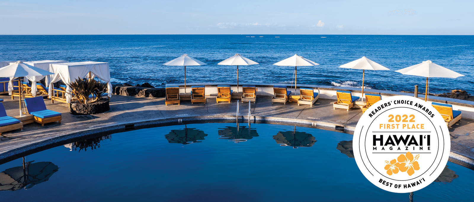swimming pool set above the ocean at Royal Kona Resort