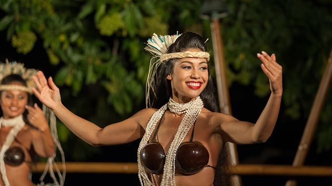 hawaiian woman with coconut bra dancing