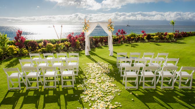 view of beachfront wedding setup
