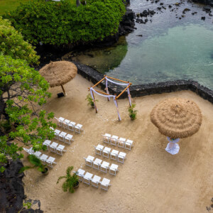 birds eye view of wedding venue on sandy beach at private lagoon 