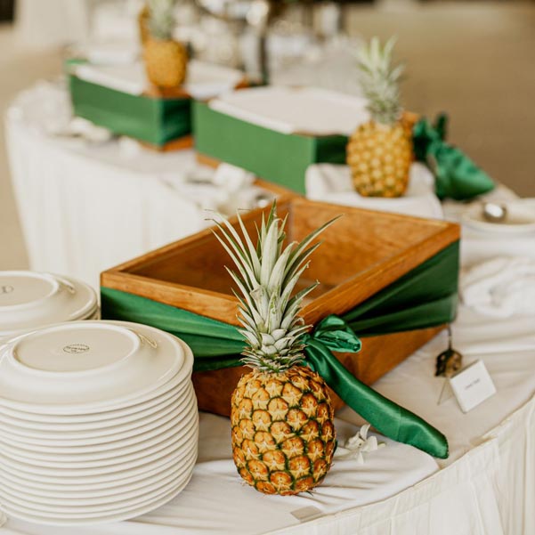 table set with pineapple arrangements