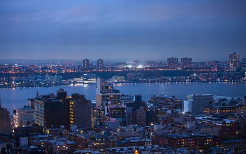 View of New New York City and the Hudson River at night