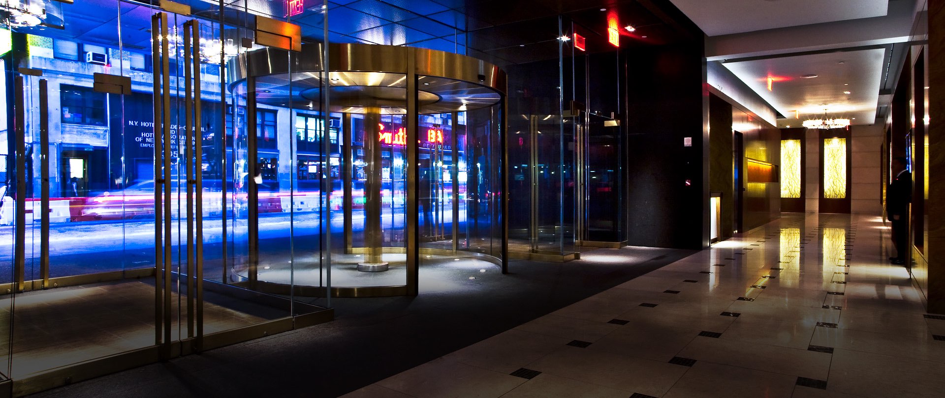 the revolving door at the hotel entrance