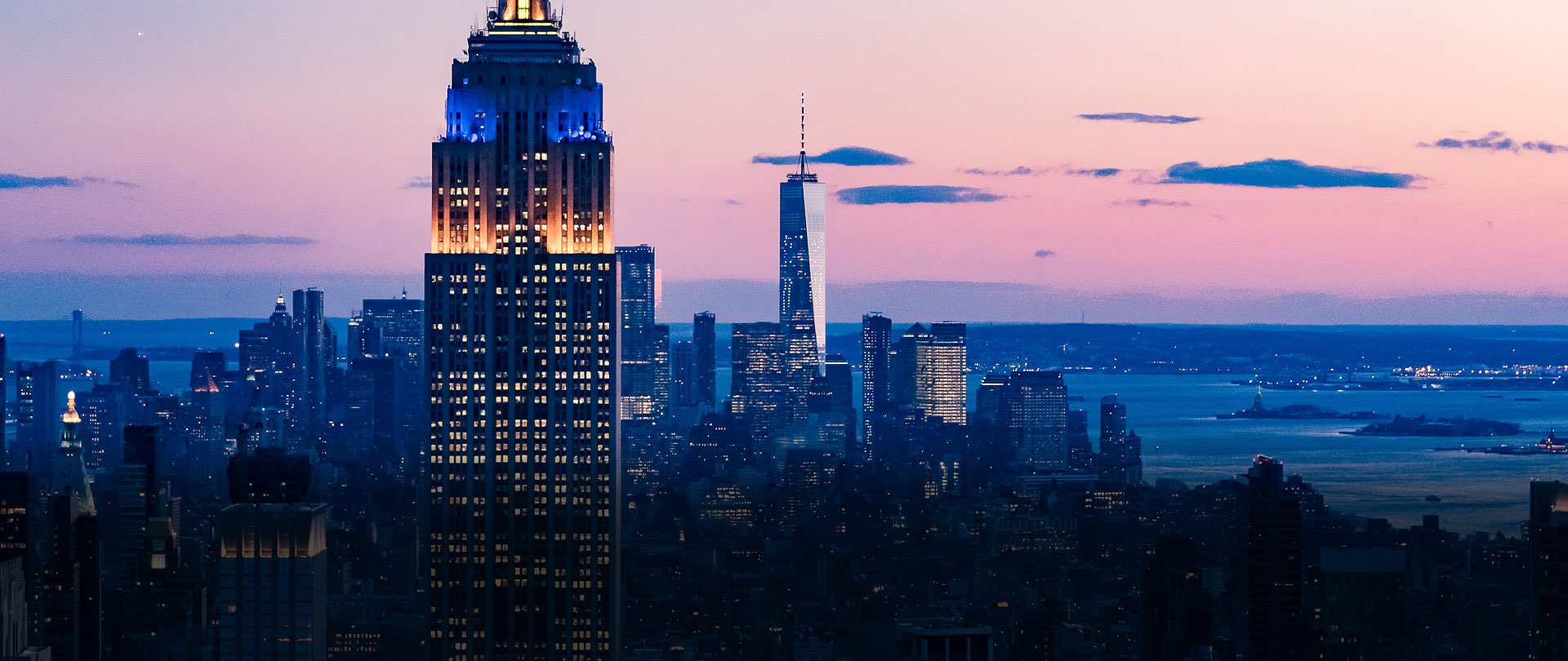 the new york skyline at dusk