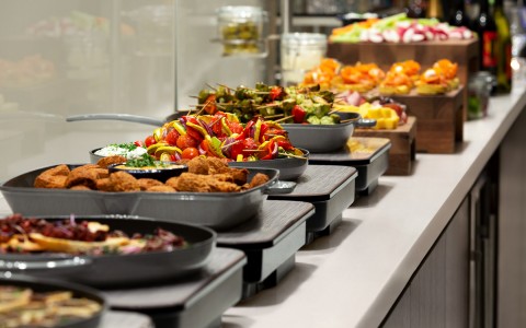 Food set up in trays for buffet