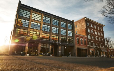 kinley exterior with sunset in background