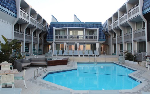 View of exterior of hotel and pool