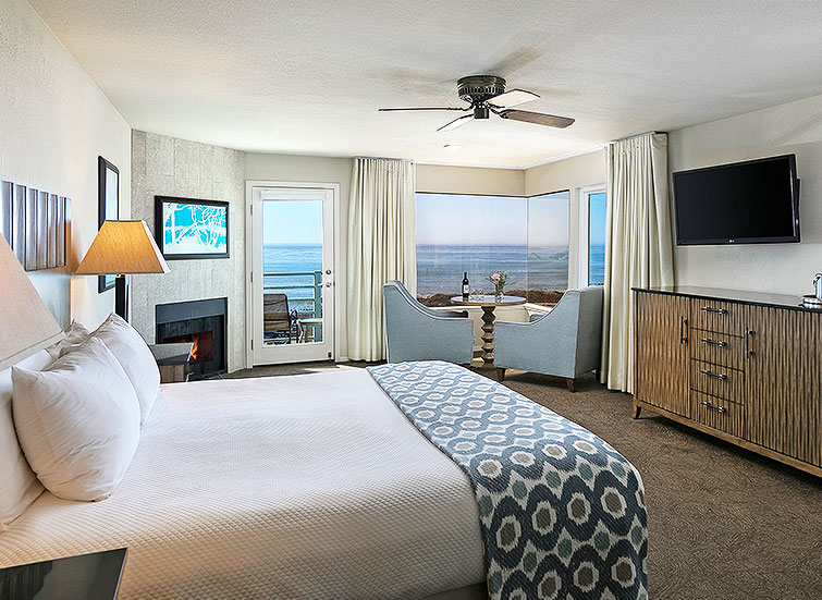 Hotel bedroom with ocean view and balcony
