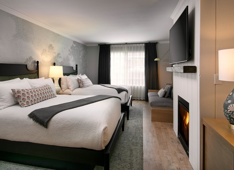 2 bed hotel room with fireplace