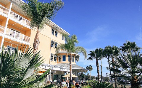 View of exterior of hotel on a sunny