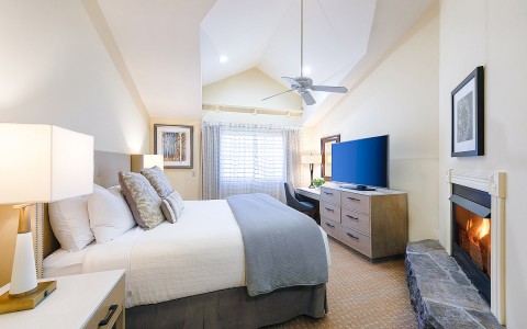 a guest room with king bed