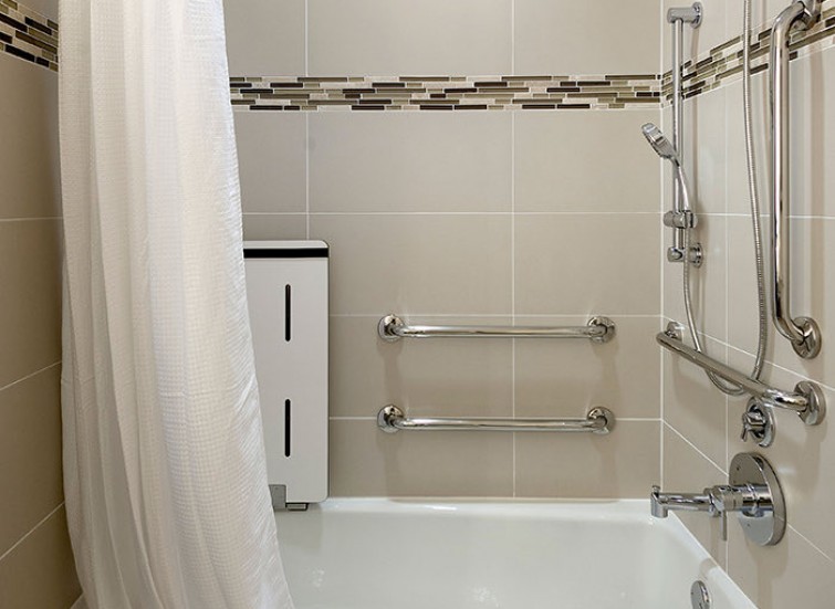 bathroom shower with ADA grab bars