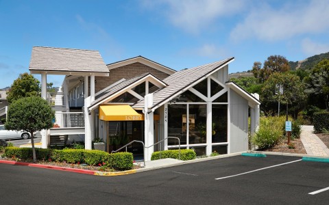 Exterior of hotel with parking lot