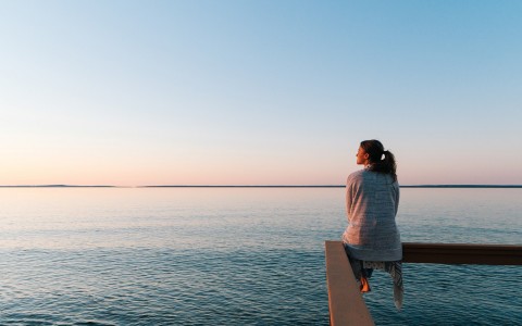 Woman looking at ocean