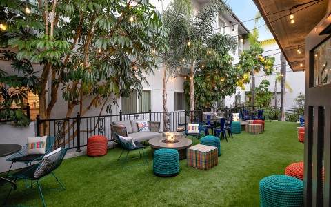 outside patio with colorful bean bag chairs