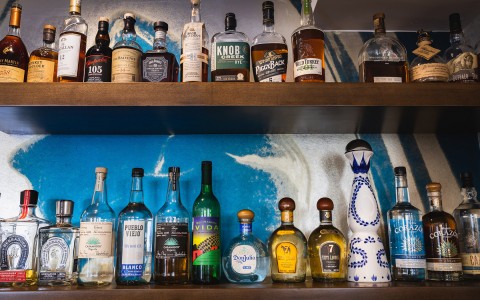 display types of liquor at azul's cafe and bar 