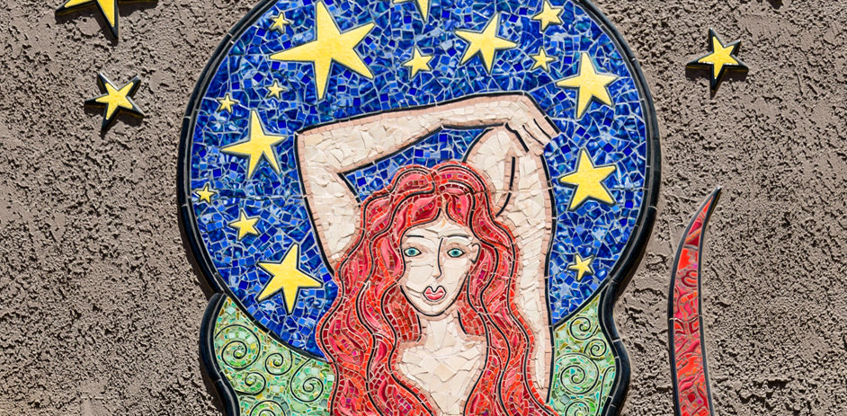 mural of a mermaid with red hair