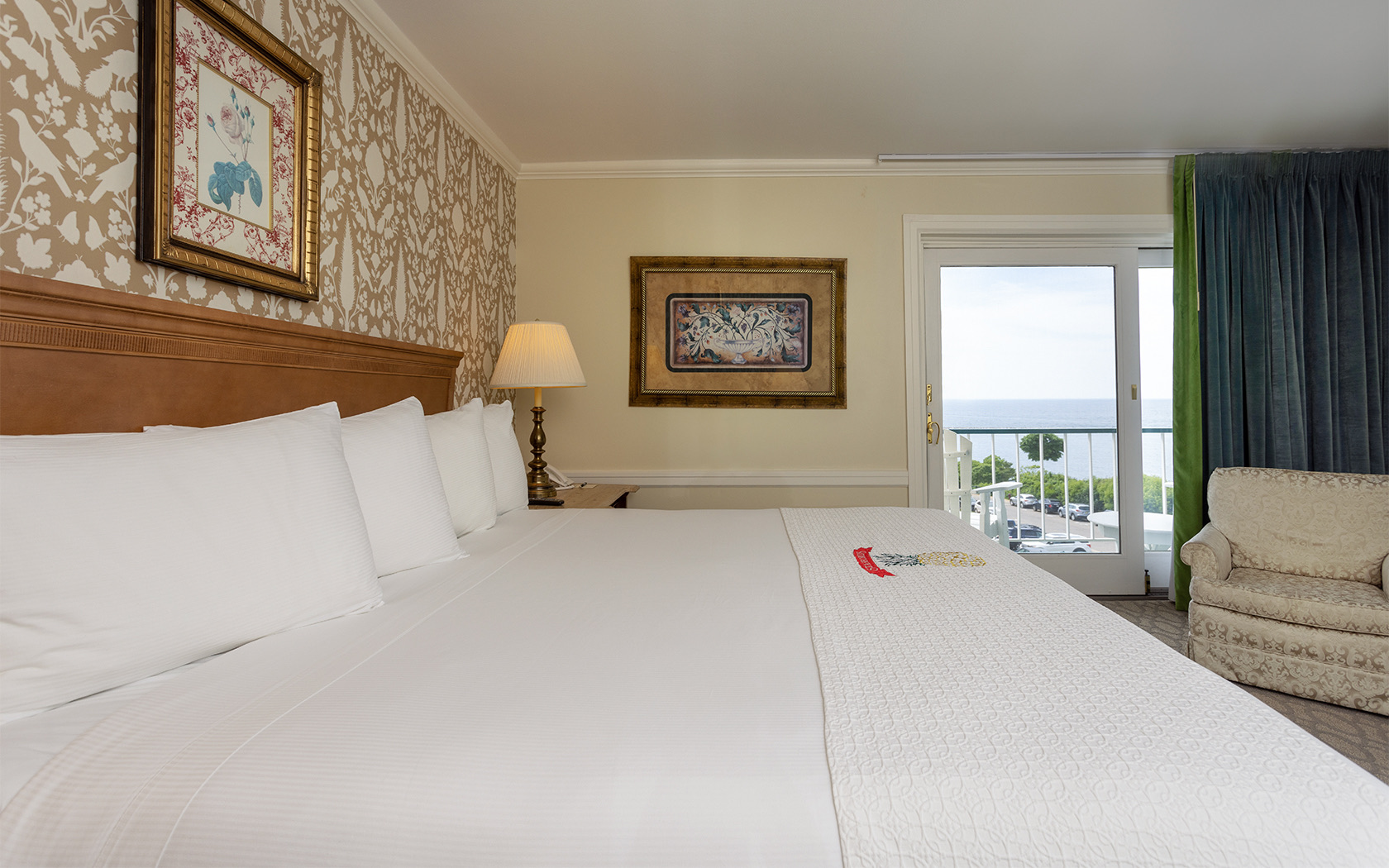 view of a queen white bed in a traditional room