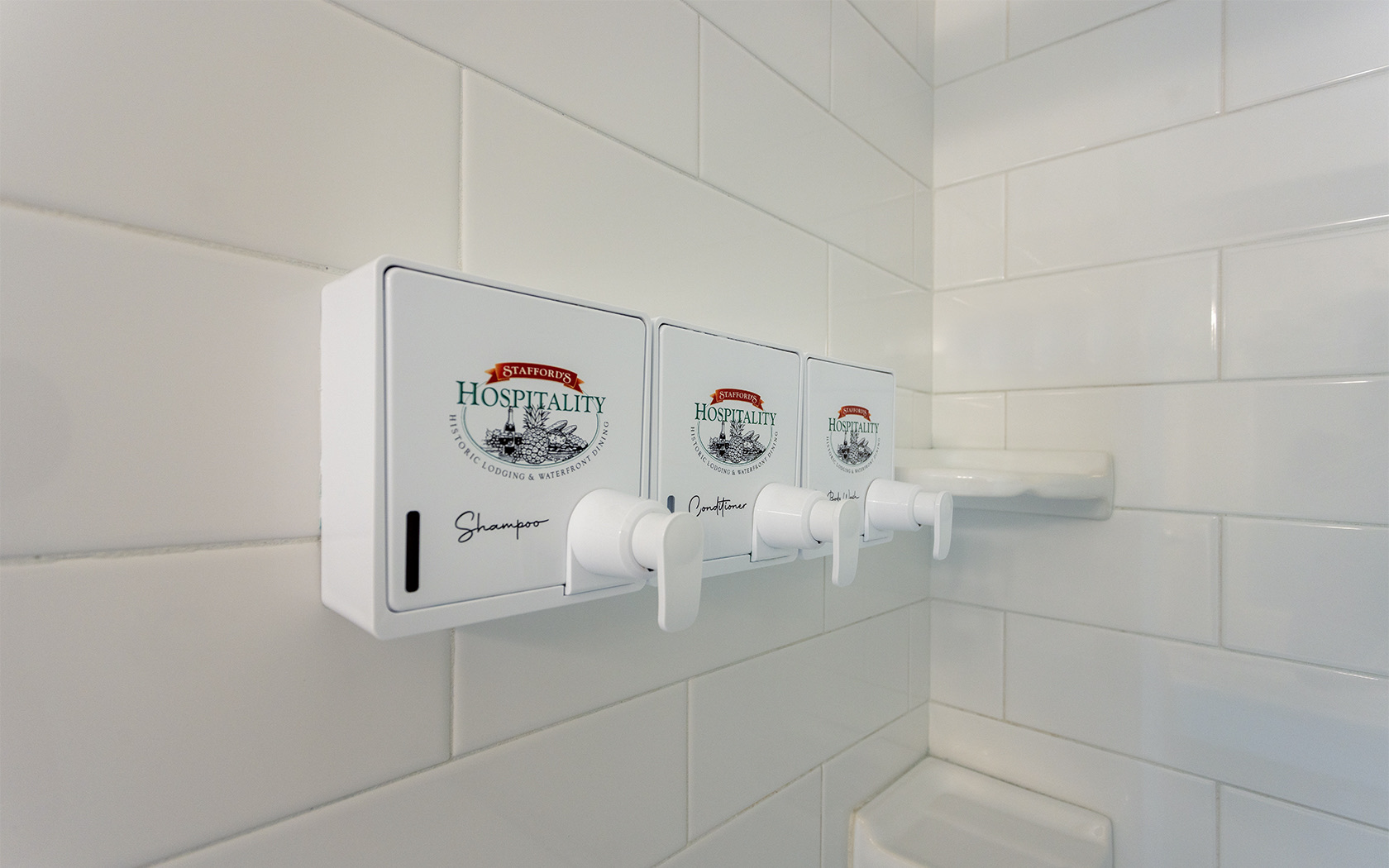shampoo dispensers in a bathroom 