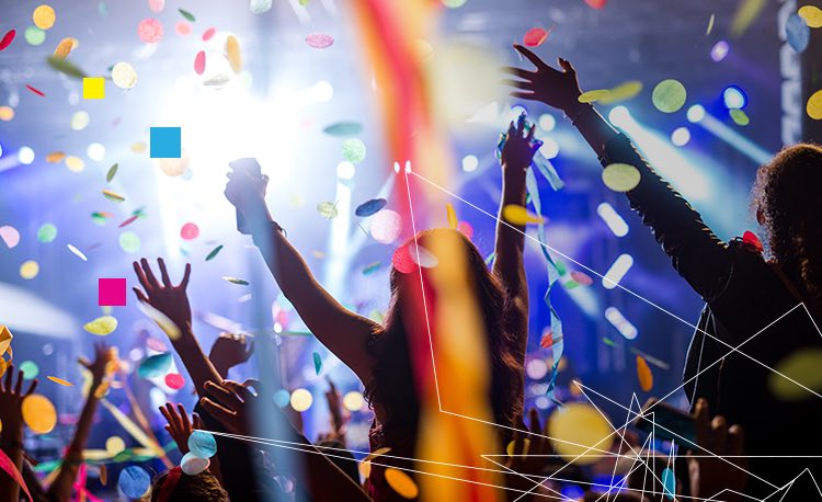 People cheering at a concert