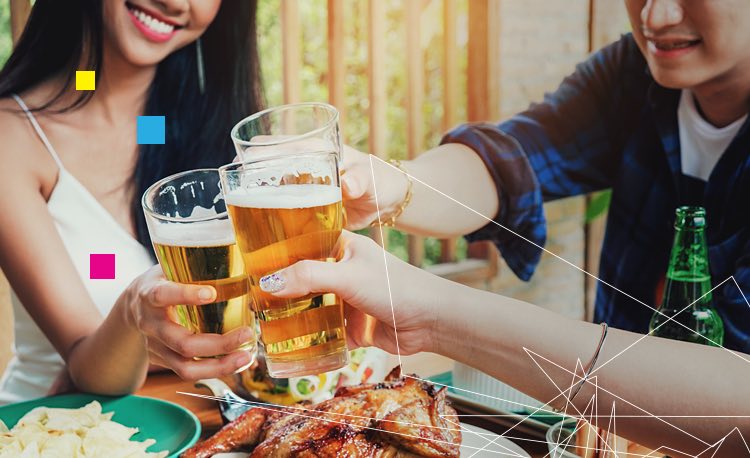 Group of friends toasting with glasses of beer