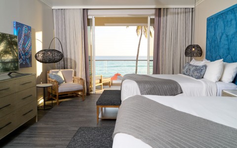 two queen beds with ocean view and balcony