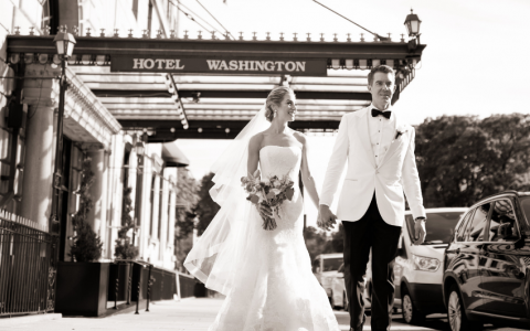 bride and groom outside of hotel washington