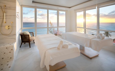 acqua spa with 2 massage beds and ocean view