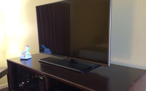 close up of the tv and tv stand 