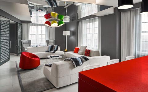 view of a living area with red accent colors 