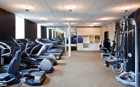 gym with weight and cardio equipment