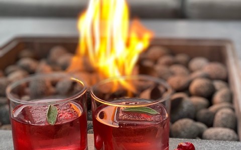 fall cocktails with fire background