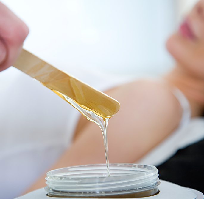 woman getting a wax treatment
