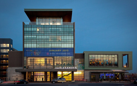 glass building lit up at night