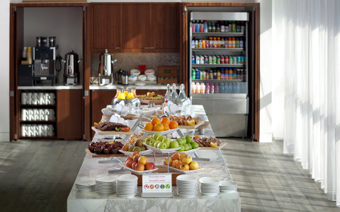 breakfast buffet on a white table cloth 