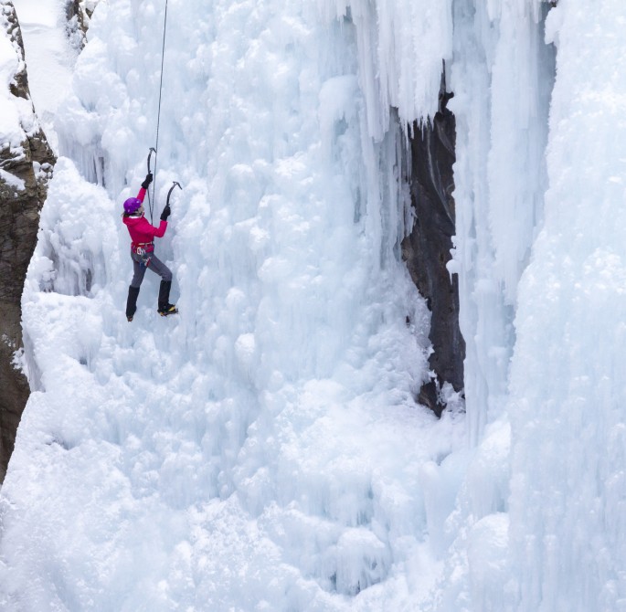 person climbing ice