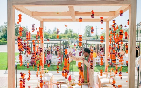  beautiful Indian wedding ceremony setup with hanging floral decor