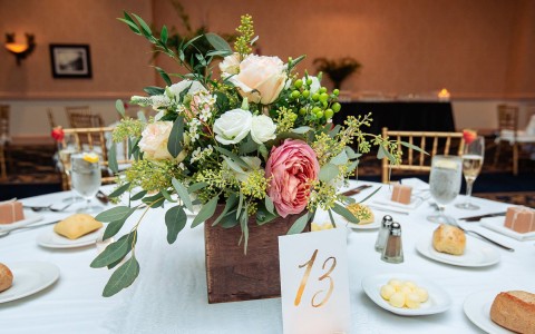 flower arrangement on dinner table