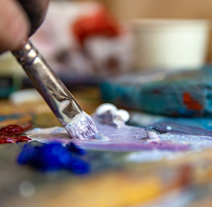 close view of a painter mixing colors