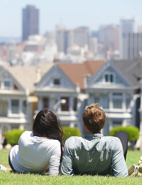 Couple on hill enjoying San Francisco view