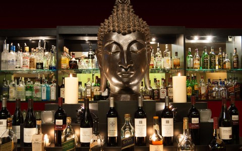 Clipper club lounge bar featuring the infamous buddha bust