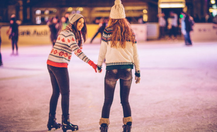 two girls ice skating